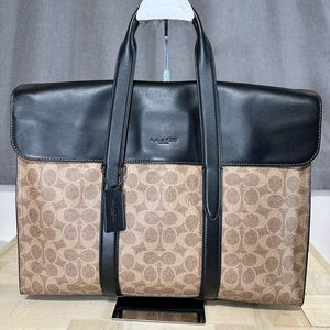 Coach portfolio in tan signature coated canvas and black leather